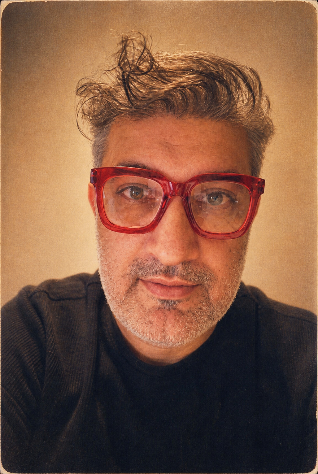 Hassan Farhat wearing red glasses